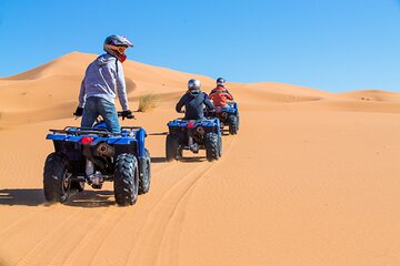 Quad dans les dunes